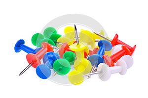 Pile of colorful pushpin isloated on white