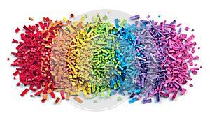 Pile of colorful rainbow toy bricks isolated on white background