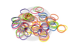 Pile of colorful rubber bands isolated on white.