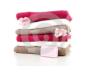 Pile of colorful towels and soap