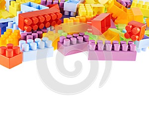 Pile of colorful toy construction bricks