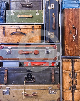 Pile of colorful vintage suitcases