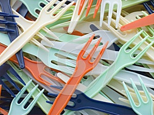 Pile Of Coloured Plastic Take Away Forks