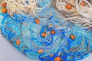 Pile of commercial fishing net with cords and floats