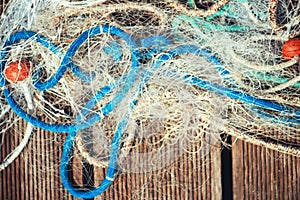 Pile of commercial fishing net with cords and floats