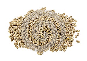 Pile of compound feed pellets isolated on a white background