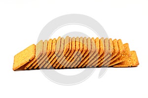 Pile of crackers with different seeds isolated on white background