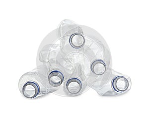 Pile of crumpled bottles isolated. Plastic recycling