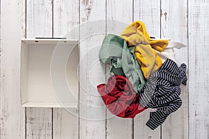Pile of crumpled clothes, organization of convenient storage, laundry, clothing care