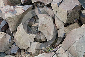 Pile of crushed big basalt boulders