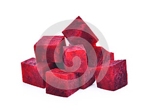 Pile of cube beetroot isolated on white