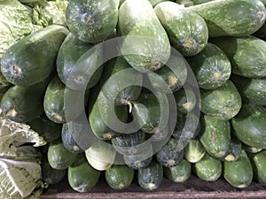 Pile of cucumbers in a traditional market