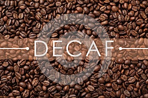 Pile of decaf coffee beans as background, top view