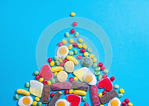 Pile of delicious colourful chewing candies background. Colourful sweets