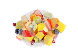 Pile of delicious fruit salad on white background, above view