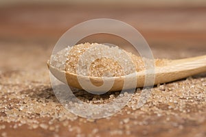Pile of demerara sugar in a spoon