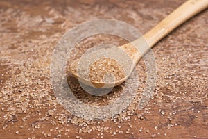 Pile of demerara sugar in a spoon