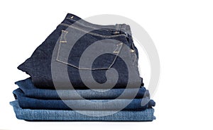 Pile of denim jeans
