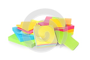 Pile of different colorful sticky notes on white background. School stationery