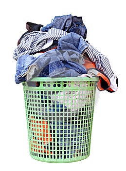 Pile of dirty laundry in a washing basket, laundry basket with colorful towel, basket with clean clothes, colorful clothes