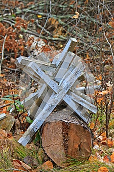 Pile of discarded crosses in cemetery in Hayward, Wisconsin