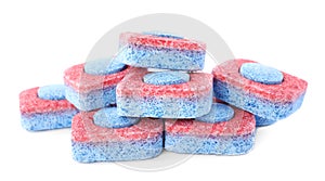 Pile of dishwasher detergent tablets on white background