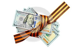 Pile of the dollars tied with a gift ribbon