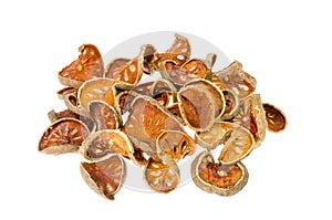 Pile of dried bael fruit isolated on white background