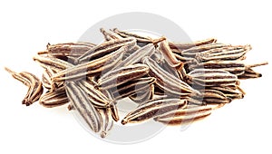 Pile of dried cumin seeds isolated on white background, macro. Caraway seeds, cuminum