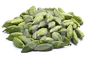 Pile of dried green cardamom pods, paths