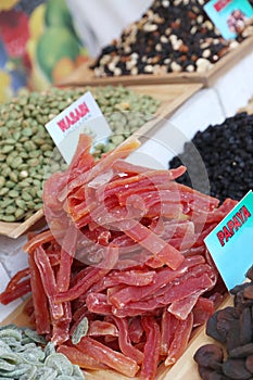 a pile of dried papaya pieces