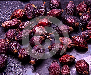 Pile of dried rose hips . Country house style. Authentically photo