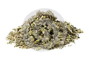 A pile of dried rubbed sage isolated on white