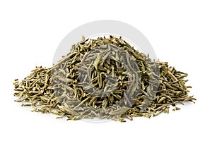 A pile of dried rubbed thyme isolated on white