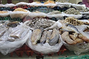 Pile of dried salted fish for sale in a traditional market