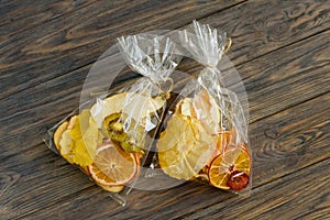 pile of dried tropical fruits on wooden background