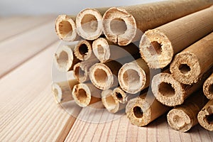 Pile of dry bamboo sticks on table