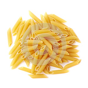 Pile of dry yellow penne pasta isolated