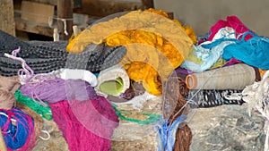 Pile of dyed thread and fabric photo