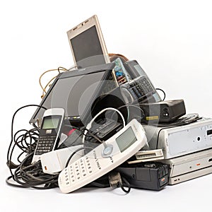 Pile of e-waste isolated on white background