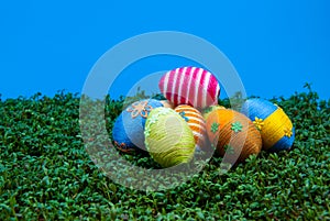 Pile of easter eggs on cress