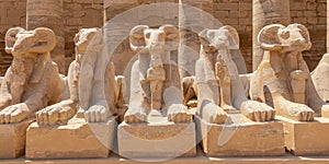 A pile of effigies of rams arranged in a row, Karnak temple, Luxor, Egypt