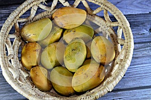 Pile of Egyptian fresh mango fruit with tropical delicacy, mangoes are nutritionally rich fruit with distinctive flavor, smell,