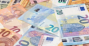 Pile of euro banknotes. Many Euro bills lie on top of each other. Bunch of money of the European Union. Currency of the united