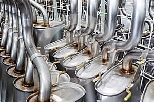 Pile Of Exhaust Pipes At The Factory Warehouse