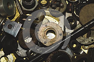 Pile of fasteners and screws close up. scrap metal. different metal details