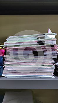 Pile of files in the office cupboard