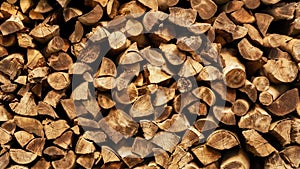 Pile of firewood in warm light