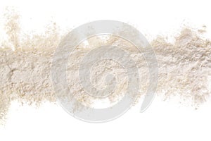 Pile of flour isolated on white background with copy space for your text. Top view. Flat lay