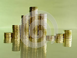 Pile folded of coins in the form of charts